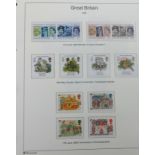 Three albums of stamps 'The Great Britain Collection'.