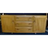 Ercol, a light elm sideboard, length 155cm, height 69cm, on ball castors.