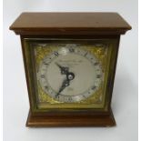 Elliot, a mahogany cased small mantle clock, the dial inscribed 'Garrard & Co, London', height 15cm