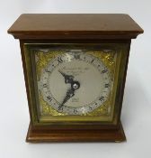 Elliot, a mahogany cased small mantle clock, the dial inscribed 'Garrard & Co, London', height 15cm