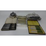Various metal wares including muffin dish, cigarette box, entrée dish, two cased sets of cutlery