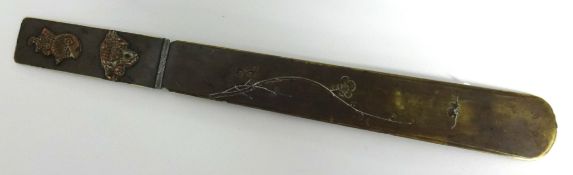 Japanese metal page turner with applied decoration, length 22cm