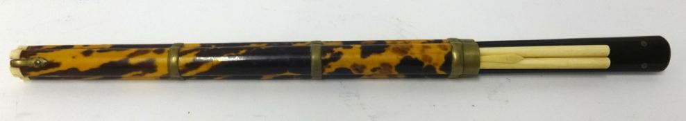 A Chinese travelling knife and chop stick set, in a tortoiseshell case.
