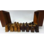 A modern carved wood chess set.