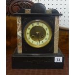 Victorian slate and marble mantle clock with bell strike and eight day movement, height 27cm.