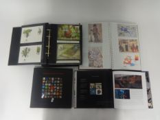 Various stamps including WWF album, Royal Mail first day cover album 1998, Royal Mail millennium