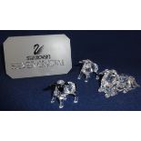 Swarovski Crystal Glass, collection of black and white sheep and two lambs, boxed (3).