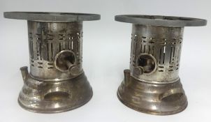 Pair of silver plated table spirit burners.