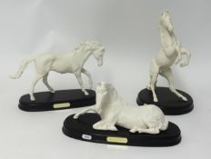 Three white Royal Doulton horses including 'Spirit Of The Wild', 'Spirit of Life' and 'Spirit of