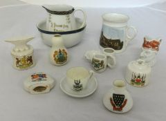 A small collection of crested china including local crests of Buckfastleigh and Plymouth.