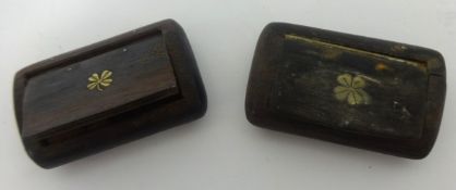 A pair of 19th Century hardwood snuff boxes.