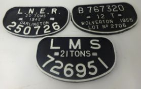 Three iron railway plaques comprising LMS 21 tonnes 26951, LNR 20 tonnes 1942 Darlington 250726