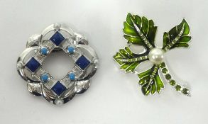 Two modern costume brooches, including 'museum collection'.
