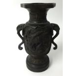 A Japanese bronze vase.