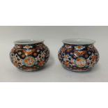 A pair of Japanese Imari jars, height 13cm
