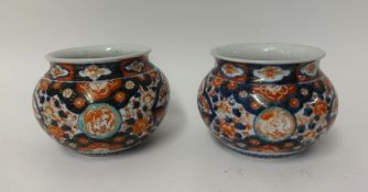 A pair of Japanese Imari jars, height 13cm