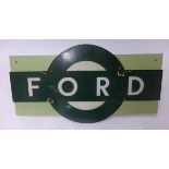 A enamelled target sign, 'Ford', width 61cm. Ford Station was on the LSWR/Southern Railway main