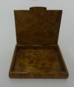 A burr wood cigarette box.