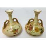 Royal Worcester, pair of squat twin handled vases, each decorated with wild flowers,