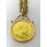 Edw VII 1903 gold sovereign set in a pendant chain.