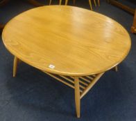 Ercol, a light elm coffee table with magazine rack.