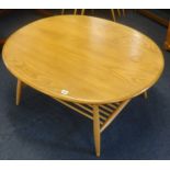 Ercol, a light elm coffee table with magazine rack.