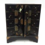 Oriental small black laquered cabinet