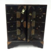Oriental small black laquered cabinet