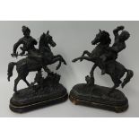 Pair of Spelter figures of horseback knights on wood bases, height 42cm