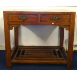A Chinese pine two drawer side table with lower slat tier, width 96cm, depth 56cm
