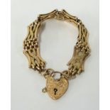 A 9ct gold bracelet with locket, approx 14.80gms.