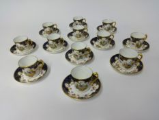Royal Crown Derby, a porcelain twelve setting coffee service.