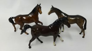 Two Beswick race horse an another unmarked (3) tallest 22cm.