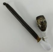 A pipe, with porcelain bowl decorated with a interior Inn scene of a fight, wood stem.