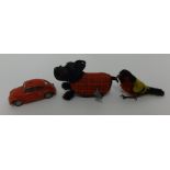 Schuco clockwork micro racer car, a German clockwork terrier dog and a clockwork bird (3)