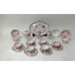 A 19th century Meissen porcelain tea service comprising 8 cups and saucers, tea pot, sugar basin,