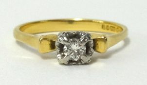 An 18ct diamond solitaire ring, finger size P.