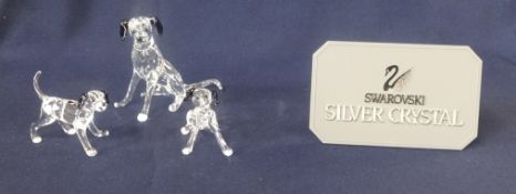 Swarovski Crystal Glass, collection of black and white dogs, boxed.