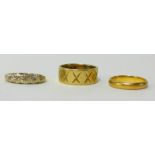 A 22ct gold wedding band (3.90gms), 18ct gold wedding band (7.90gms) and a 9ct gold dress ring.