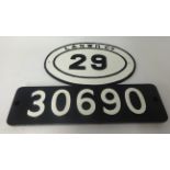 A rectangular train number plate 30690, width 56cm, glued together, also an L and NWR Company oval