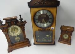 An oak cased cuckoo clock and another.