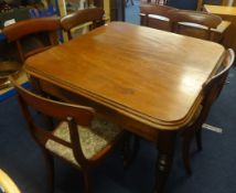 Victorian mahogany dining table and six mahogany framed bar back dining chairs