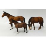 Three matt Beswick horses, tallest 20cm