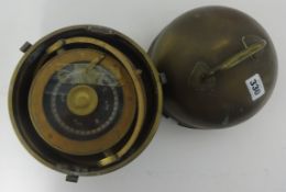 A brass cased binnacle compass with cover.