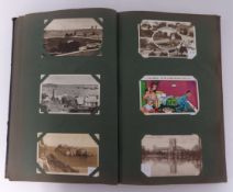 An album of Edwardian and later postcards.