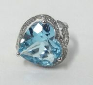 A 14k white gold and diamond ring set with a heart shape blue topaz approx 9.86ct, diamonds approx