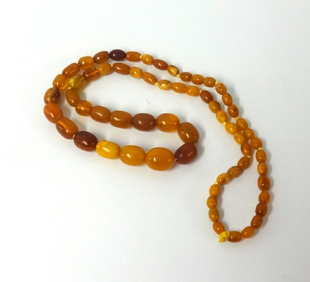 Amber mixed necklace, 37.5gms, 27 inches long.