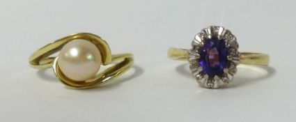 Two dress rings, an 18ct amethyst and diamond cluster ring and a single pearl ring, stamped 585 (