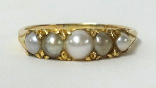 A 9ct pearl five stone ring, finger size P.