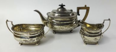 A 20th Century three piece silver tea set, approx 28.42ozs.